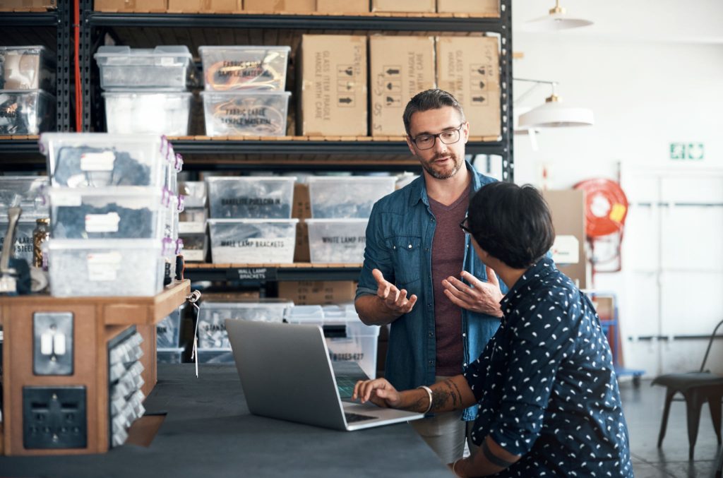 A Small Business Owner Talking to his Employee about Cyber Security